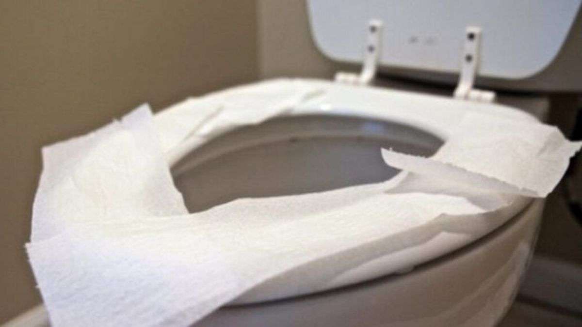 Ne posez jamais de papier toilette sur la cuvette des toilettes